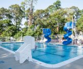 Geometric commercial pool with basketball hoop